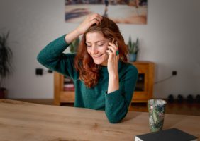 Woman talking over the phone