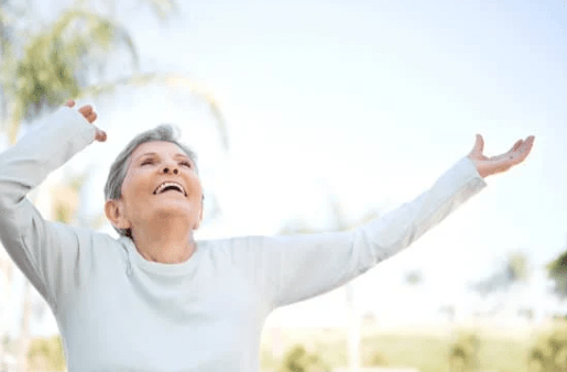 Elderly lady doing morning stretches