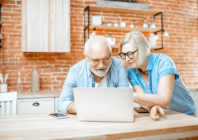 Elderly couple on the computer